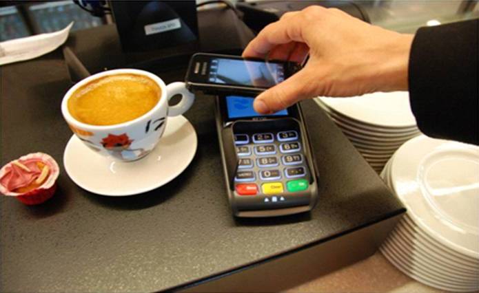 A contactless payment being made with a phone
